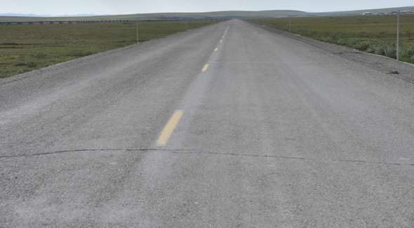 Deteriorating pavement, about 45 miles south of Deadhorse
