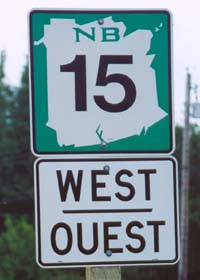 New Brunswick route marker, with number within white provincial map on dark green background