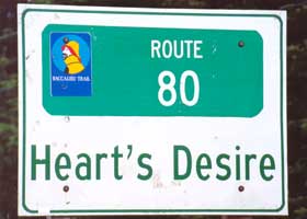 Heart's Desire village sign, including small Baccalieu Trail marker
